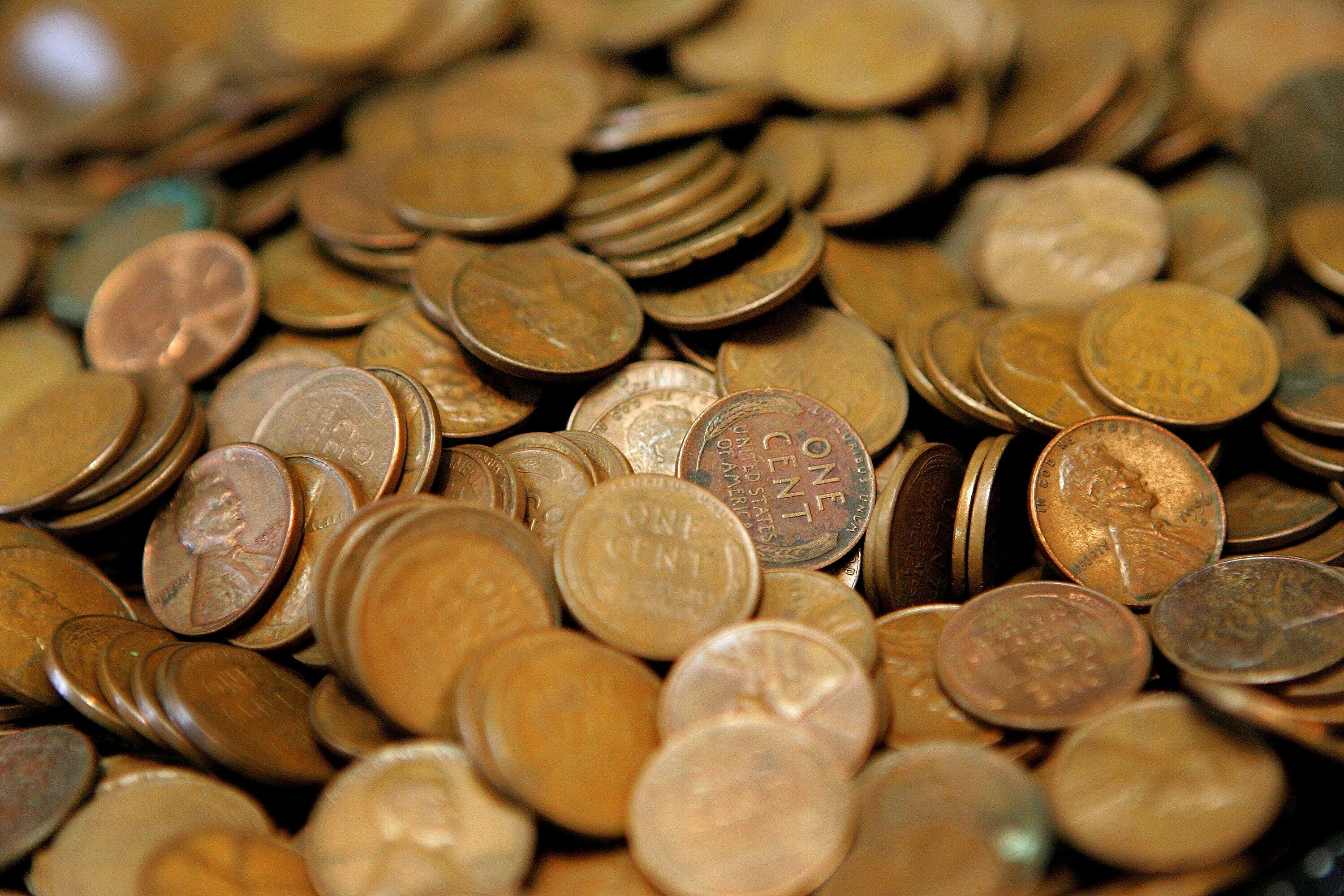 GLENVIEW, IL - JULY 06: Pennies are displayed at Glenview Coin & Collectibles July 6, 2006 in Glenview, Illinois. Reportedly due to manufacturing costs, the US Mint may be contemplating discontinuing the penny.  (Photo by Tim Boyle/Getty Images)