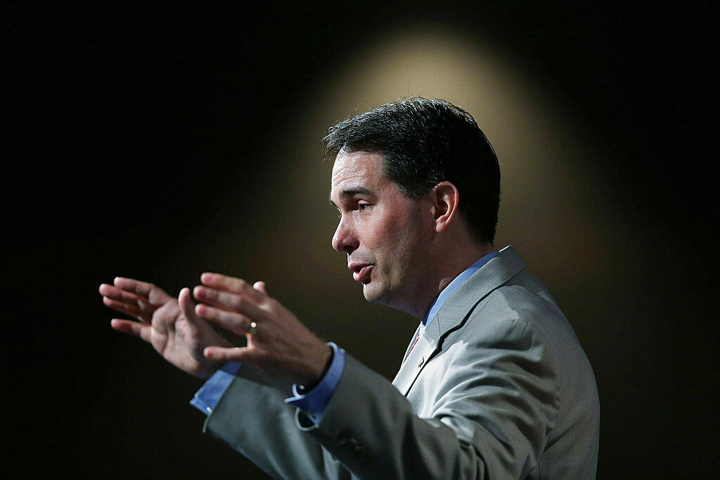 ORLANDO, FL - JUNE 02:  Wisconsin Governor Scott Walker and possible Republican presidential candidate speaks during the Rick Scott's Economic Growth Summit held at the Disney's Yacht and Beach Club Convention Center on June 2, 2015 in Orlando, Florida. Many of the leading Republican presidential candidates are scheduled to speak during the event.  (Photo by Joe Raedle/Getty Images)