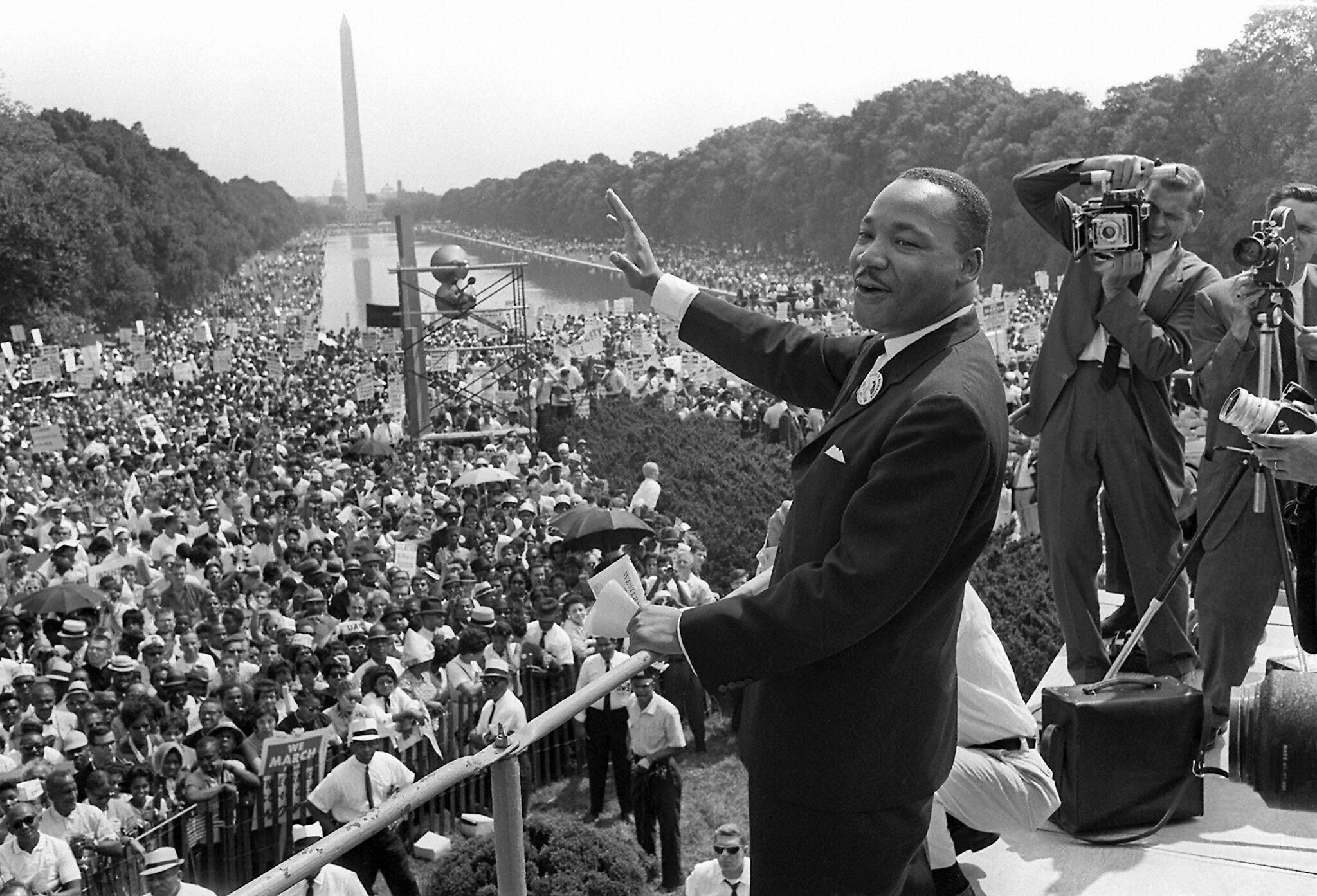 WASHINGTON, UNITED STATES:  (FILES) US civil rights leader Martin Luther King, Jr., waves to supporters from the steps of the Lincoln Memorial 28 August, 1963, on The Mall in Washington, DC, during the 