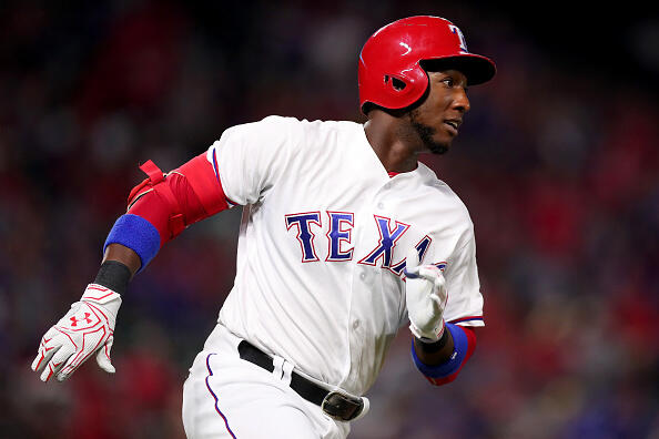ARLINGTON, TX - SEPTEMBER 21:  Jurickson Profar #19 of the Texas Rangers hits a triple in the bottom off the third inning against the Los Angeles Angels at Globe Life Park in Arlington on September 21, 2016 in Arlington, Texas.  (Photo by Tom Pennington/Getty Images)