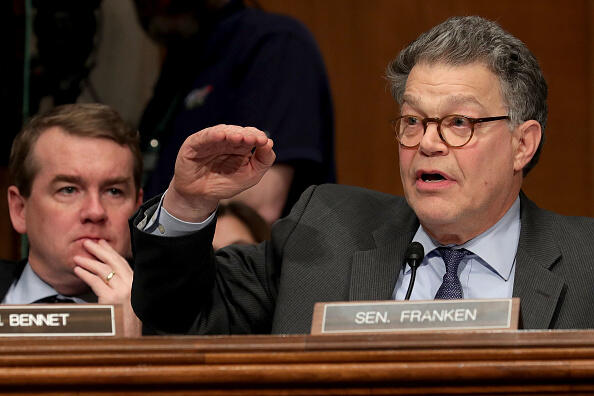 WASHINGTON, DC - JANUARY 17:  Senate Health, Education, Labor and Pensions Committee member Sen. Al Franken (D-MN) (R) questions Betsy DeVos, President-elect Donald Trump's pick to be the next Secretary of Education, with Sen. Michael Bennet (D-CO) during her confirmation hearing in the Dirksen Senate Office Building on Capitol Hill  January 17, 2017 in Washington, DC. DeVos is known for her advocacy of school choice and education voucher programs and is a long-time leader of the Republican Party in Michigan.  (Photo by Chip Somodevilla/Getty Images)