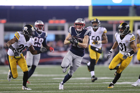 FOXBORO, MA - JANUARY 22:  Chris Hogan #15 of the New England Patriots carries the ball against the Pittsburgh Steelers during the third quarter in the AFC Championship Game at Gillette Stadium on January 22, 2017 in Foxboro, Massachusetts.  (Photo by Maddie Meyer/Getty Images)