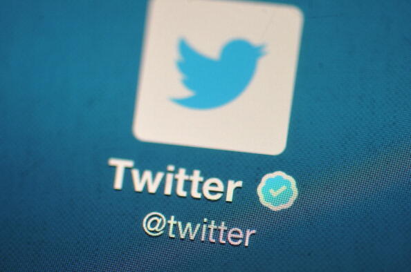 LONDON, ENGLAND - NOVEMBER 07:  In this photo illustration, The Twitter logo is displayed on a mobile device as the company announced it's initial public offering and debut on the New York Stock Exchange on November 7, 2013 in London, England. Twitter wen