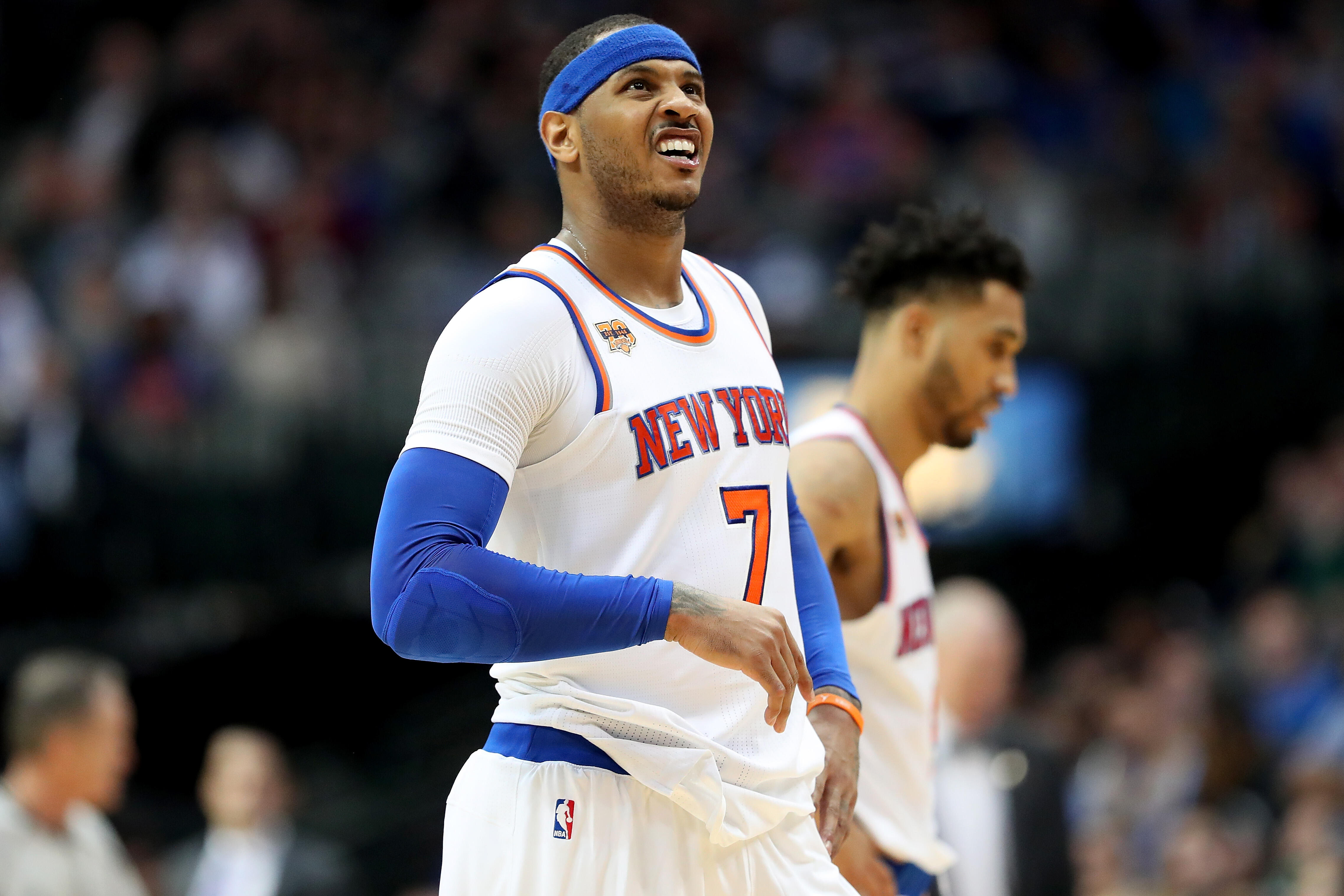 DALLAS, TX - JANUARY 25:  Carmelo Anthony #7 of the New York Knicks reacts against the Dallas Mavericks in the second half at American Airlines Center on January 25, 2017 in Dallas, Texas. NOTE TO USER: User expressly acknowledges and agrees that, by down