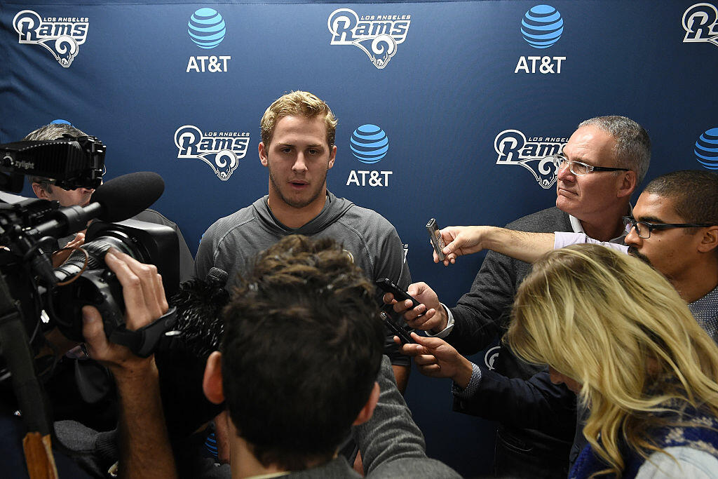 THOUSAND OAKS, CA - JANUARY 13:  (Center) Quarterback Jared Goff of the Los Angeles Rams talks to the media after a press conference announcing the hiring of Sean McVay as the new head coach of the Rams on January 13, 2017 in Thousand Oaks, California. McVay is the youngest head coach in NFL history.  (Photo by Lisa Blumenfeld/Getty Images)