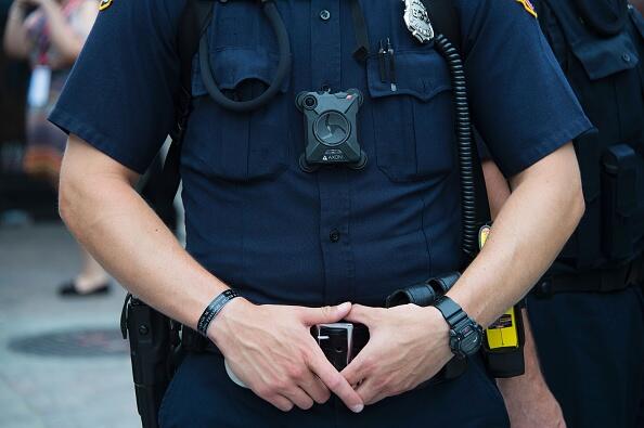 A police officer wears a body camera on during an anti-Donald Trump protest in Cleveland, Ohio, near the Republican National Convention site July 18, 2016. The Republican Party opened its national convention Monday, kicking off a four-day political jamboree that will anoint billionaire Donald Trump as its presidential nominee. / AFP / JIM WATSON        (Photo credit should read JIM WATSON/AFP/Getty Images)