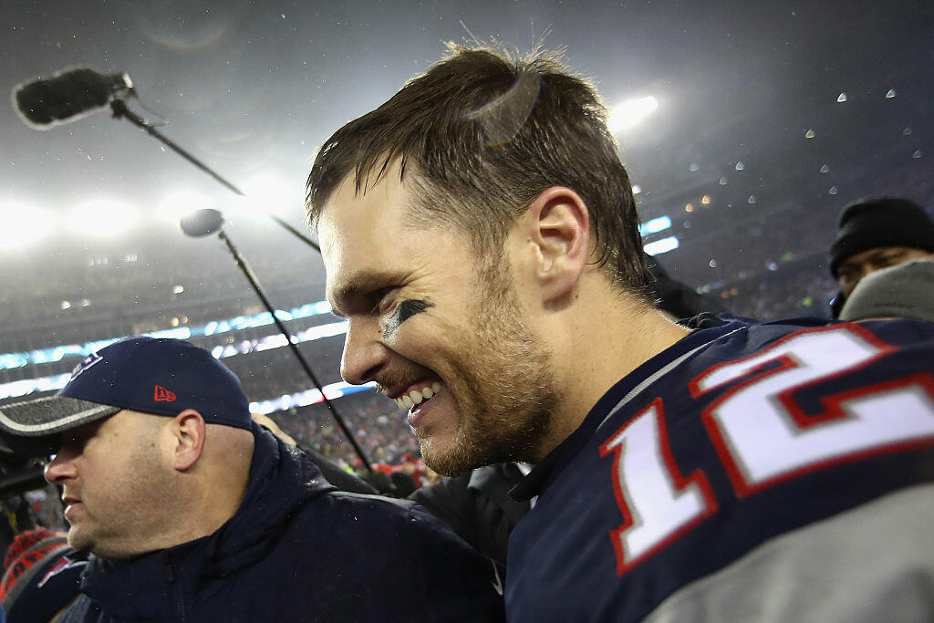 FOXBORO, MA - JANUARY 22:  Tom Brady #12 of the New England Patriots reacts after defeating the Pittsburgh Steelers 36-17 to win the AFC Championship Game at Gillette Stadium on January 22, 2017 in Foxboro, Massachusetts.  (Photo by Elsa/Getty Images)