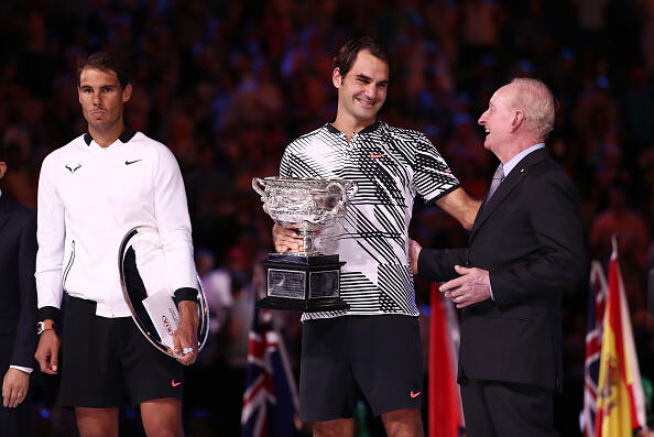 MELBOURNE, AUSTRALIA - JANUARY 29:  Rafael Nadal of Spain and Rod Laver look on as Roger Federer of Switzerland poses with the Norman Brookes Challenge Cup on stage after the Men's Final match on day 14 of the 2017 Australian Open at Melbourne Park on January 29, 2017 in Melbourne, Australia.  (Photo by Scott Barbour/Getty Images)