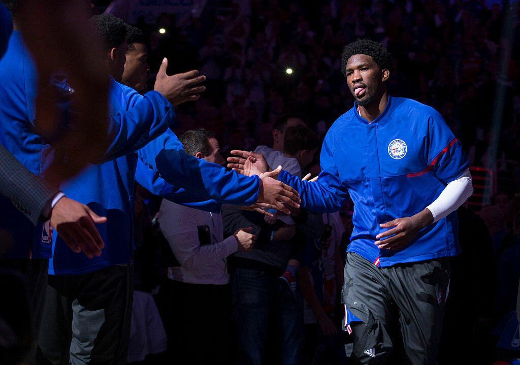 PHILADELPHIA, PA - OCTOBER 26: Joel Embiid #21 of the Philadelphia 76ers is introduced prior to the game against the Oklahoma City Thunder at Wells Fargo Center on October 26, 2016 in Philadelphia, Pennsylvania. NOTE TO USER: User expressly acknowledges and agrees that, by downloading and or using this photograph, User is consenting to the terms and conditions of the Getty Images License Agreement. The Thunder defeated the 76ers 103-97. (Photo by Mitchell Leff/Getty Images)