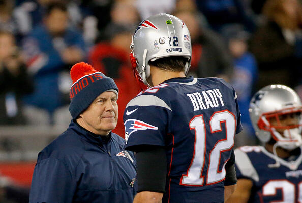 FOXBORO, MA - NOVEMBER 13:  Head coach Bill Belichick talks with Tom Brady #12 of the New England Patriots before a game against the Seattle Seahawks at Gillette Stadium on November 13, 2016 in Foxboro, Massachusetts.  (Photo by Jim Rogash/Getty Images)