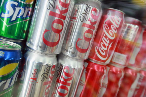CHICAGO, IL - APRIL 17:  Cans of Sprite, Diet Coke and Coca-Cola are offered for sale at a grocery store on April 17, 2012 in Chicago, Illinois. The Coca-Cola Co. reported an 8 percent increase in net income for the first quarter of 2012 with global volum