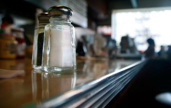 NEW YORK - APRIL 23 (PHOTO ILLUSTRATION):  Salt and pepper shakers are seen in a diner April 23, 2009 in New York City. New York City's health department is discussing regulating the amount of salt used in restaurant food.  (Photo by Mario Tama/Getty Imag