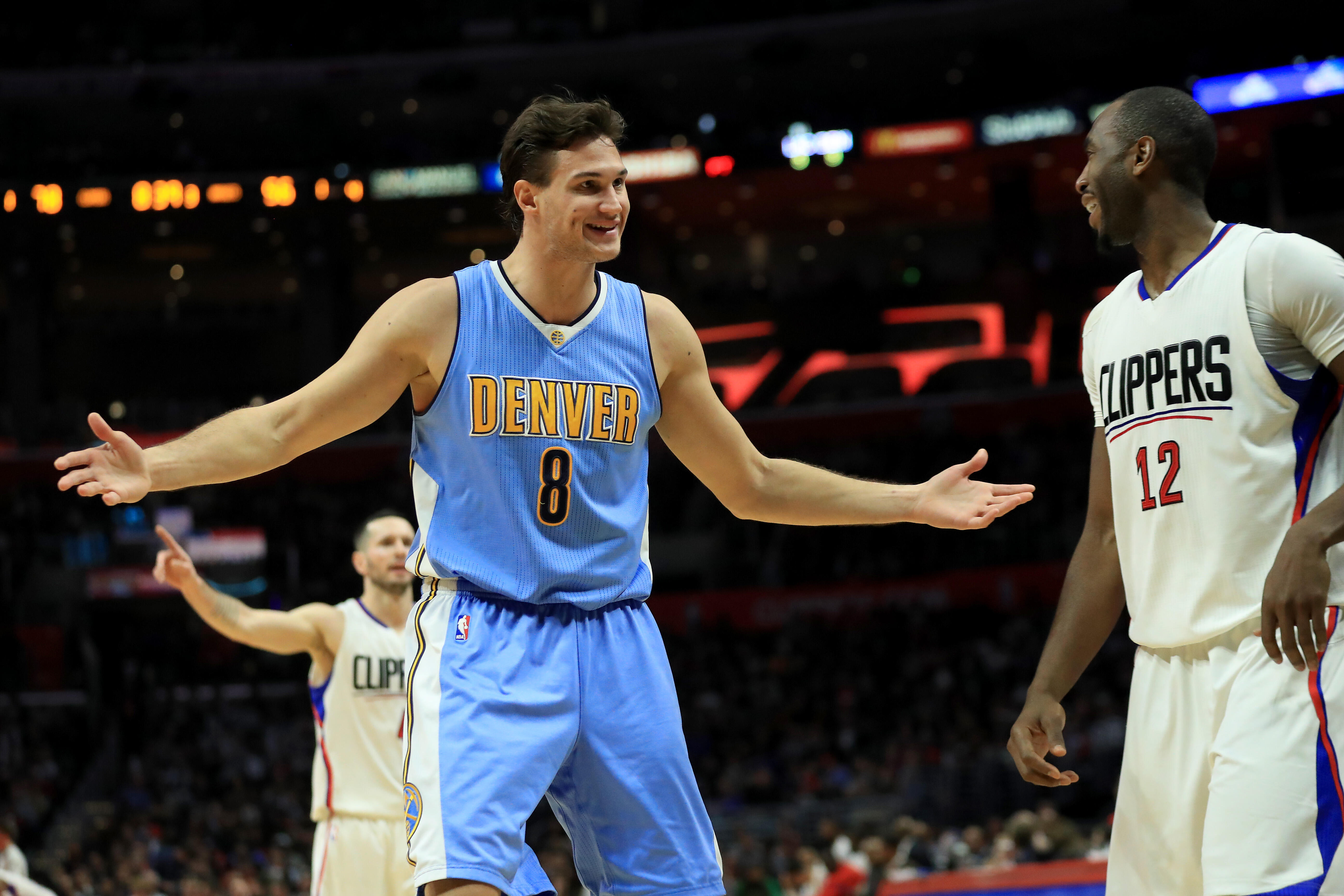 LOS ANGELES, CA - DECEMBER 20:  Danilo Gallinari #8 of the Denver Nuggets gestures to Luc Mbah a Moute #12 of the LA Clippers during the second half of a game at Staples Center on December 20, 2016 in Los Angeles, California.   NOTE TO USER: User expressl