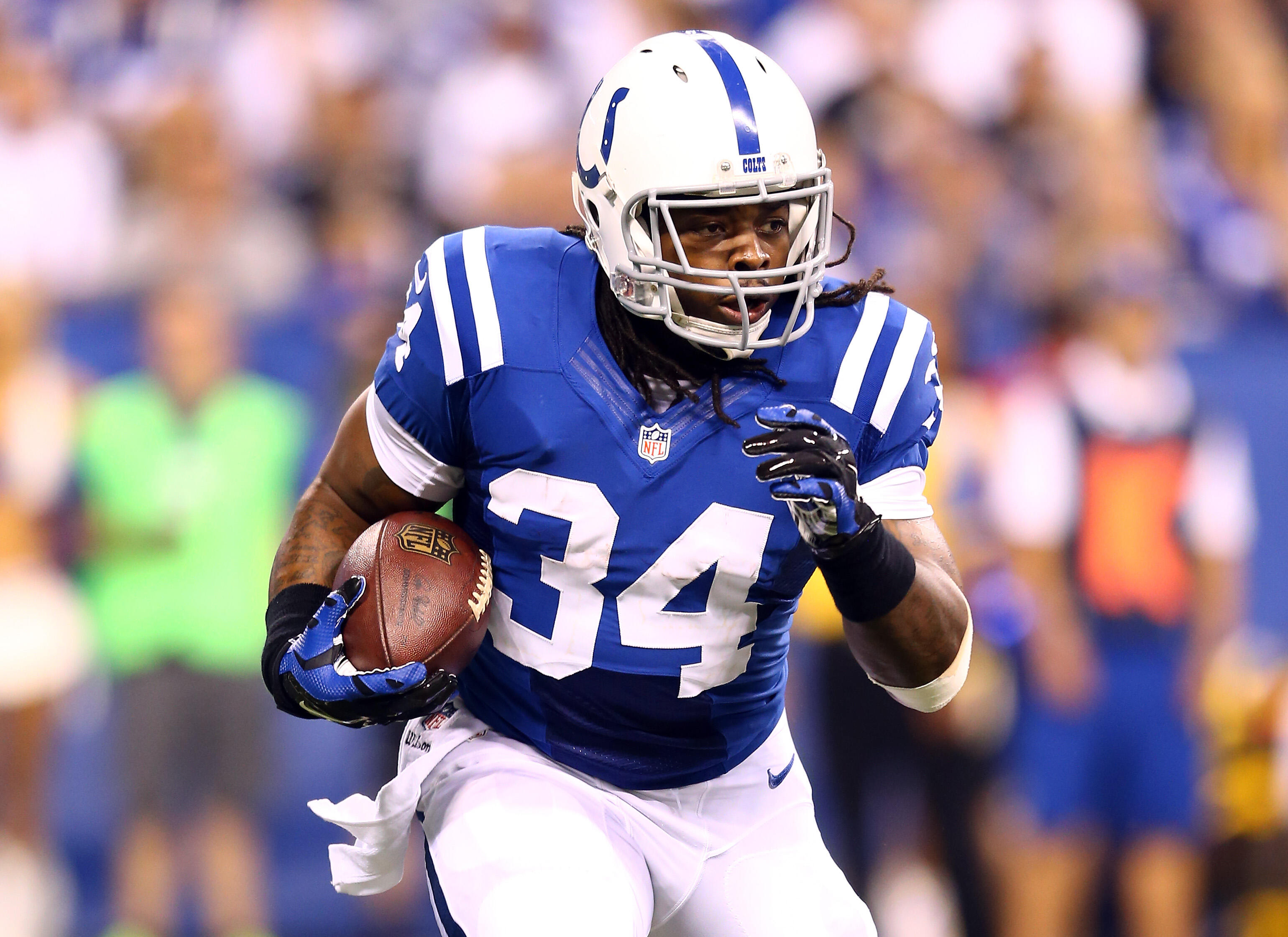 INDIANAPOLIS, IN - SEPTEMBER 15: Running back Trent Richardson #34 of the Indianapolis Colts carries the ball against the Philadelphia Eagles during a game at Lucas Oil Stadium on September 15, 2014 in Indianapolis, Indiana.  (Photo by Andy Lyons/Getty Im