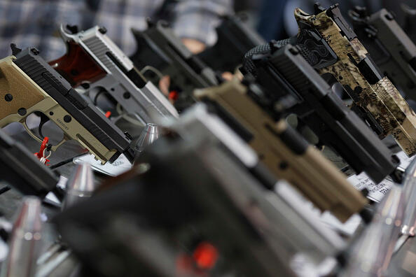 A range of pistols is seen on display at a National Rifle Association outdoor sports trade show on February 10, 2017 in Harrisburg, Pennsylvania. The Great American Outdoor Show, a nine day event celebrating hunting, fishing and outdoor traditions, features over 1,000 exhibitors ranging from shooting manufacturers to outfitters to fishing boats and RVs, and archery to art.   / AFP / DOMINICK REUTER        (Photo credit should read DOMINICK REUTER/AFP/Getty Images)