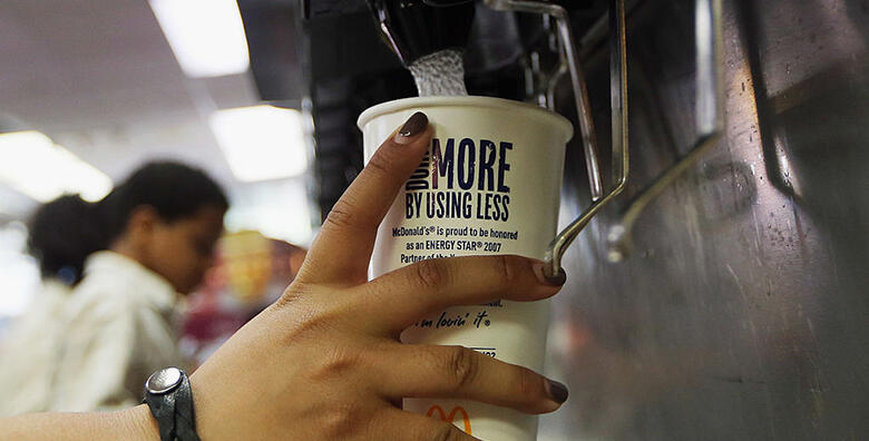 NEW YORK, NY - SEPTEMBER 13: A customer fills a 21 ounce cup with soda at a 'McDonalds' on September 13, 2012 in New York City. In an effort to combat obesity, the New York City Board of Health voted to ban the sale of large sugary drinks. The controversi