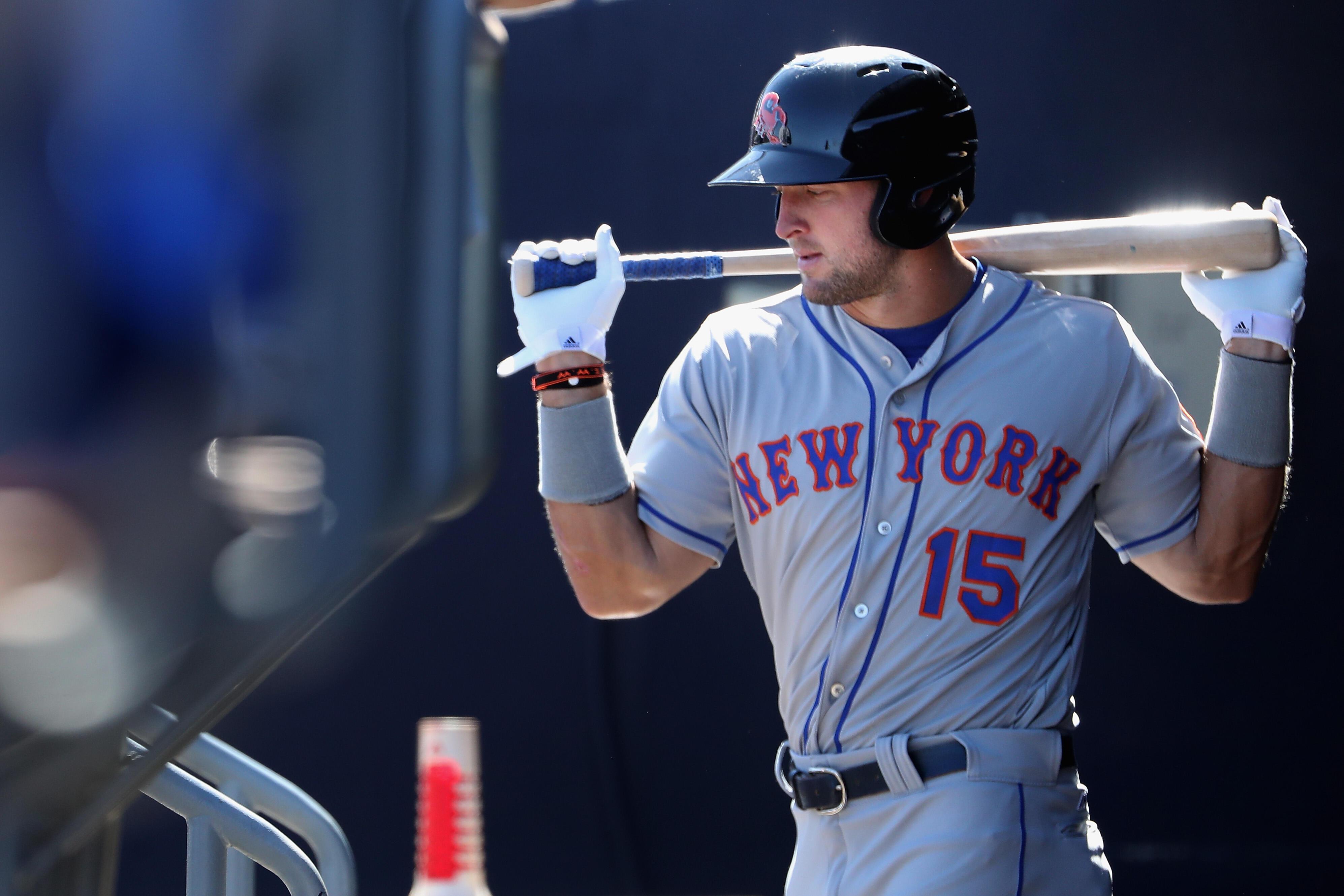 PEORIA, AZ - OCTOBER 13:  Tim Tebow #15 (New York Mets) of the Scottsdale Scorpions warms up in the dugout during the Arizona Fall League game against the Peoria Javelinas at Peoria Stadium on October 13, 2016 in Peoria, Arizona.  (Photo by Christian Pete