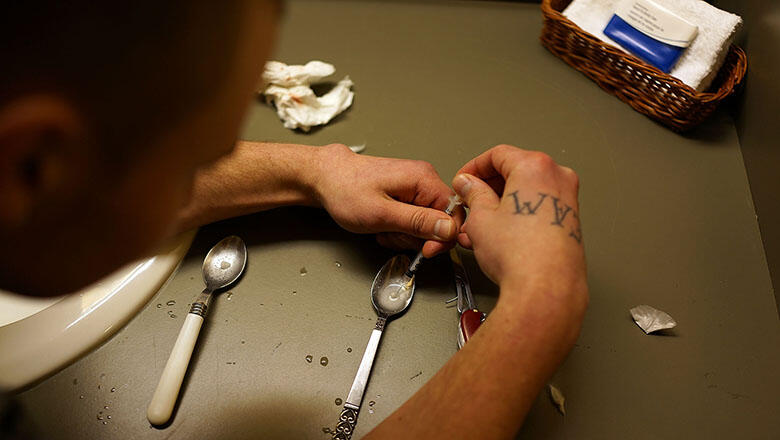 ST. JOHNSBURY, VT - FEBRUARY 06:   Drugs are prepared to shoot intravenously by a user addicted to heroin on February 6, 2014 in St. Johnsbury Vermont. Vermont Governor Peter Shumlin recently devoted his entire State of the State speech to the scourge of 