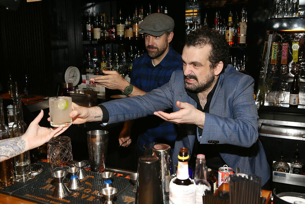 AUSTIN, TX - MARCH 10:  Jason Sudekis and Nacho Vigalondo mix drinks during the Colossal after party at SXSW on March 10, 2017 in Austin, Texas.  (Photo by Joe Scarnici/Getty Images)