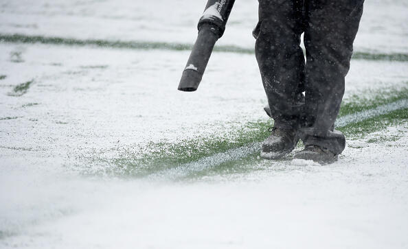 MINNEAPOLIS, MN - MARCH 12: A crew member melts the snow on the lines during a break in the action in the first half of the match between the Minnesota United FC and the Atlanta United FC on March 12, 2017 at TCF Bank Stadium in Minneapolis, Minnesota. (Photo by Hannah Foslien/Getty Images)