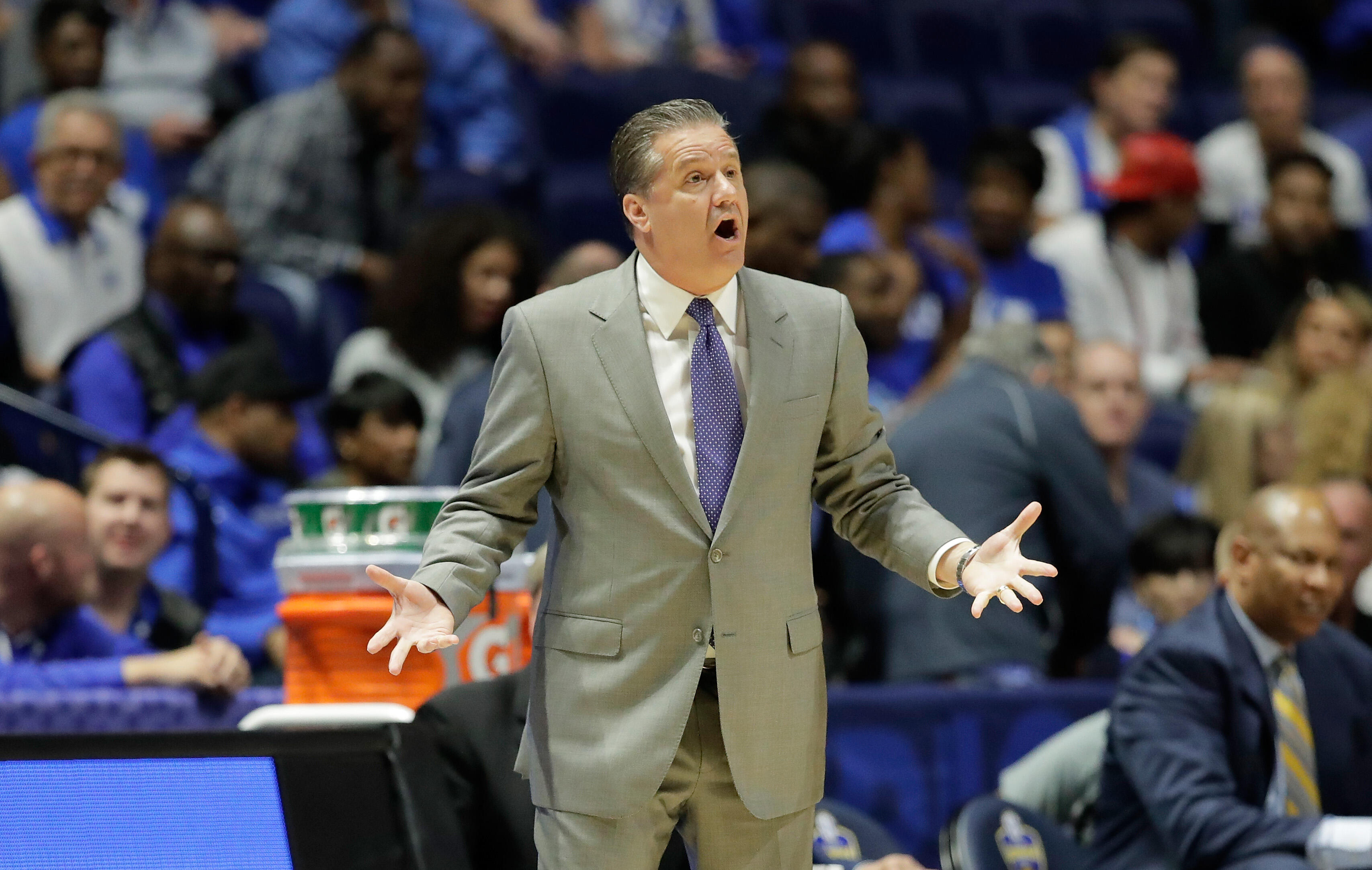 NASHVILLE, TN - MARCH 10:  John Calipari the head coach of the Kentucky Wildcats gives instructions to his team against the Georgia Bulldogs during the quarterfinals of the SEC Basketball Tournament at Bridgestone Arena on March 10, 2017 in Nashville, Ten
