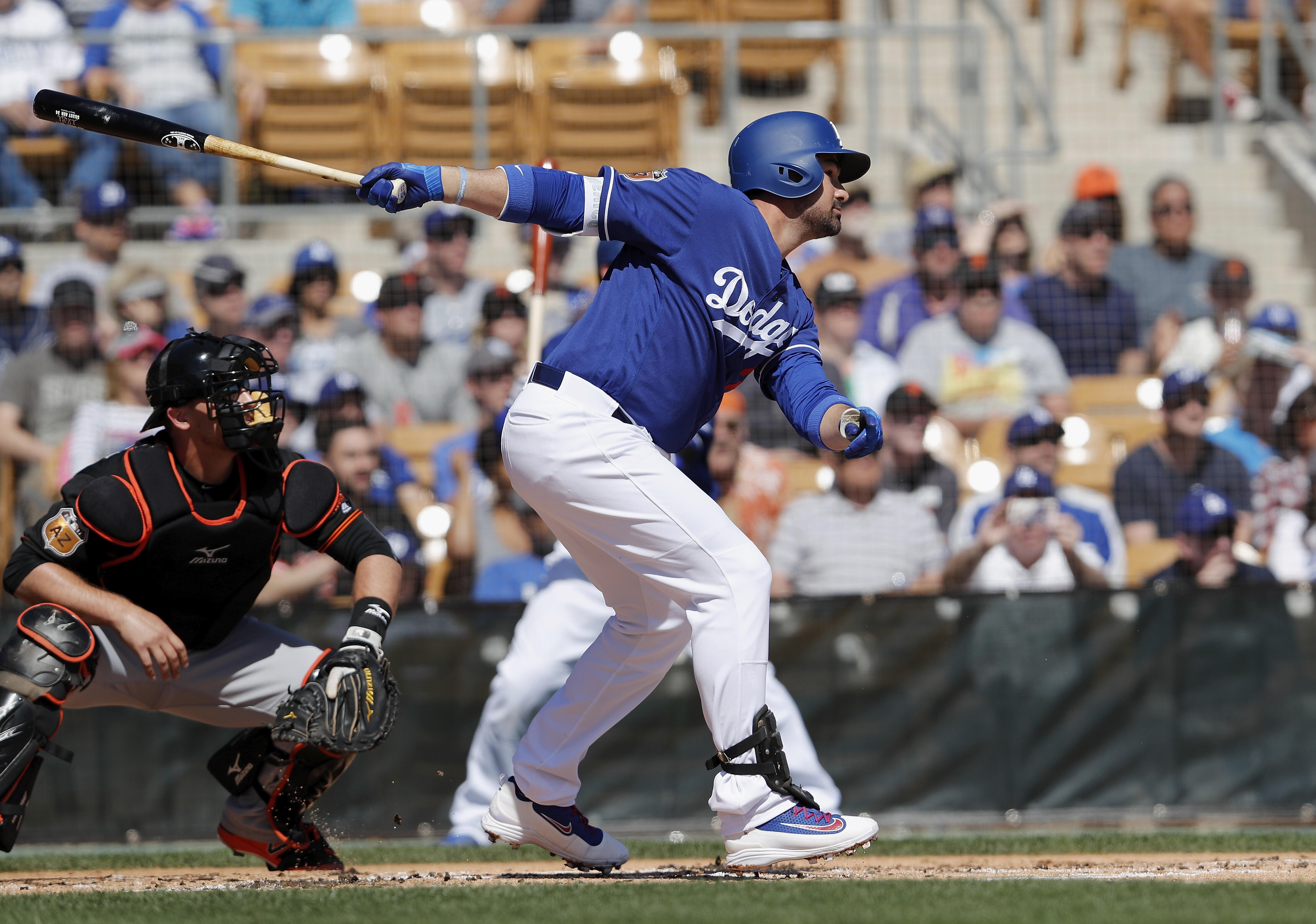 GLENDALE, AZ - MARCH 07:  Adrian Gonzalez #23 of the Los Angeles Dodgers singles in the first inning against the San Francisco Giants during the spring training game at Camelback Ranch on March 7, 2017 in Glendale, Arizona.  (Photo by Tim Warner/Getty Ima