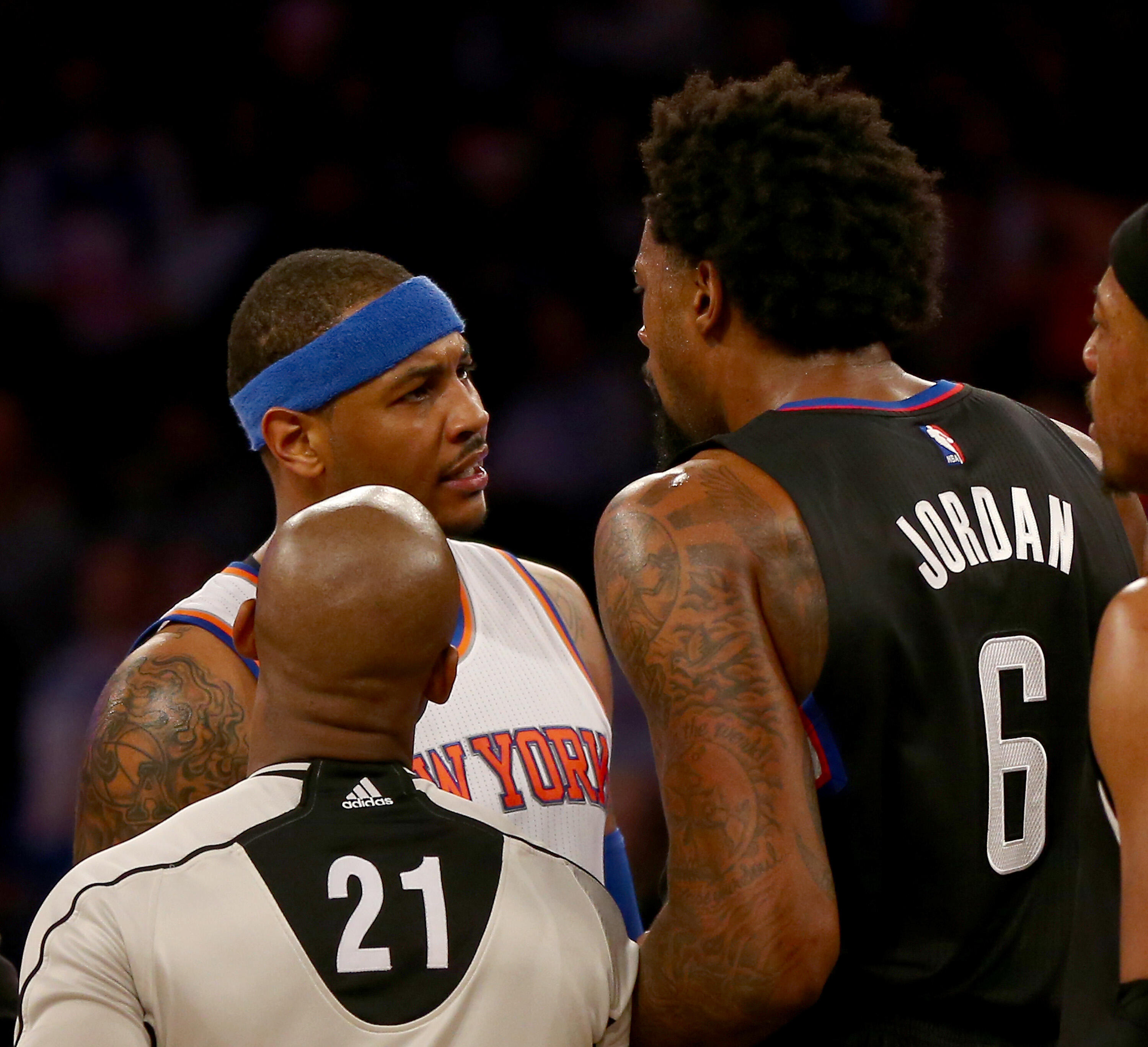 NEW YORK, NY - JANUARY 22:  Carmelo Anthony #7 of the New York Knicks and DeAndre Jordan #6 of the Los Angeles Clippers exchange words in the third quarter at Madison Square Garden on January 22, 2016 in New York City.The Los Angeles Clippers defeated the