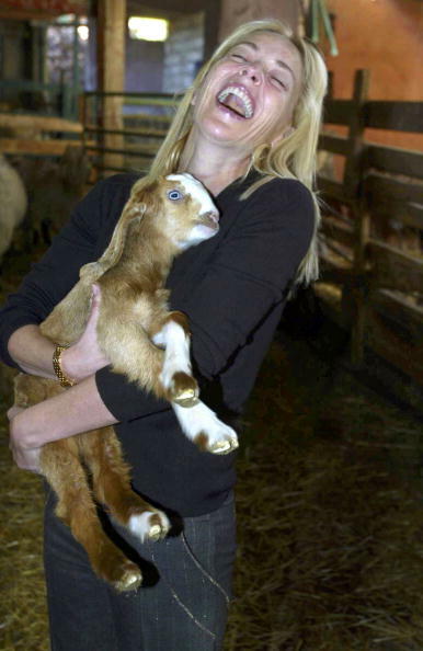 MIZPE HAYAMIM, ISRAEL - MARCH 11:  (ISRAEL OUT)  Actress Sharon Stone picks up a new born kid goat, which was duly named after her, during her visit March 11, 2006 to the Mizpe Hayamim spa and resort in northern Israel. Stone is on a 5-day visit to Israel