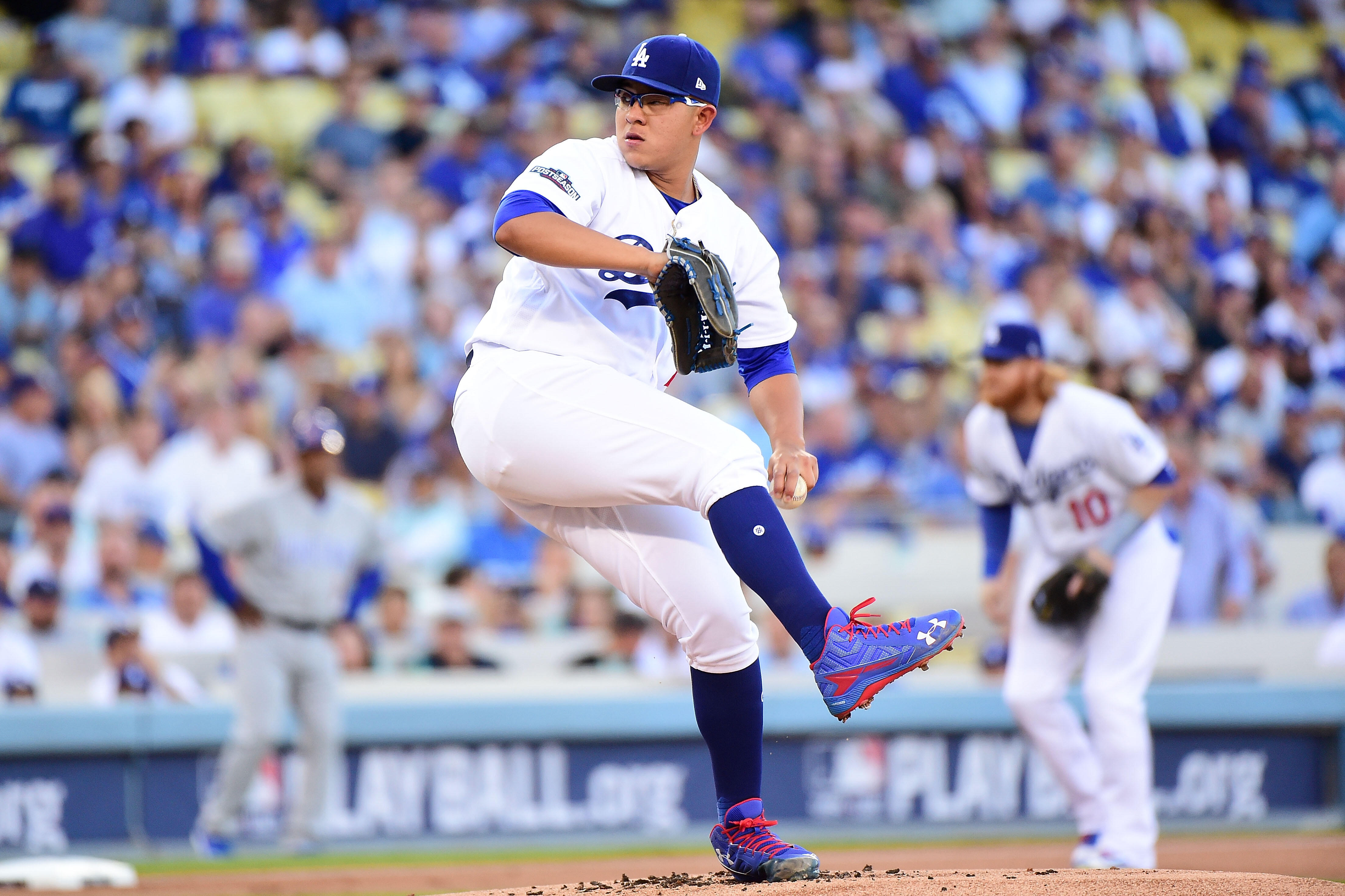 LOS ANGELES, CA - OCTOBER 19:  Julio Urias #7 of the Los Angeles Dodgers delivers a pitch against the Chicago Cubs in the first inning of game four of the National League Championship Series at Dodger Stadium on October 19, 2016 in Los Angeles, California