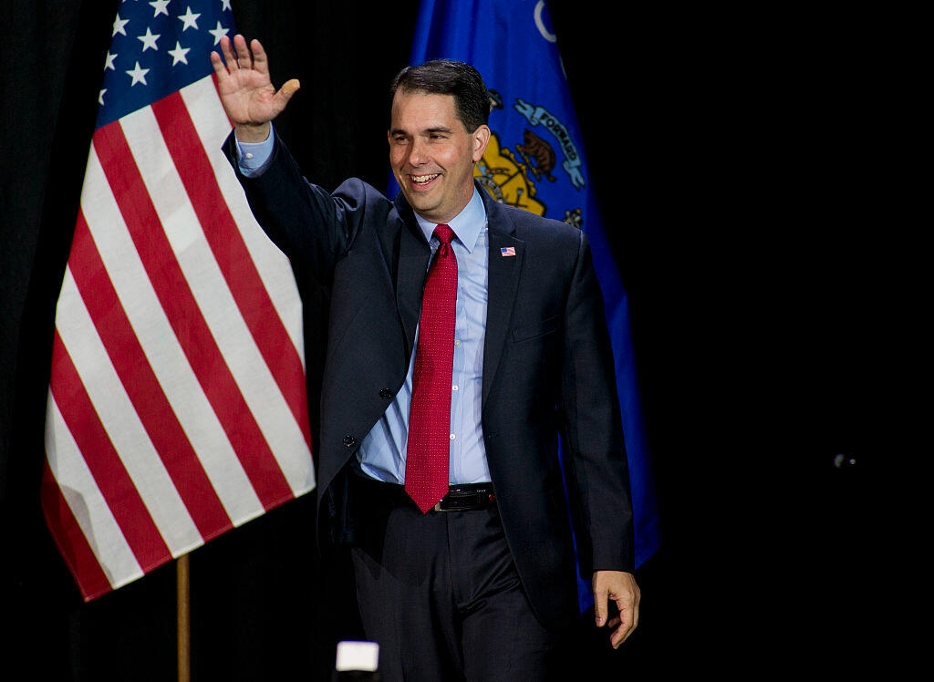 WEST ALLIS, WI - NOVEMBER 4: Wisconsin Gov. Scott Walker greets supporters at his election night party November 4, 2014 in West Allis, Wisconsin. Walker defeated Democratic challenger Mary Burke. (Photo by Darren Hauck/Getty Images)