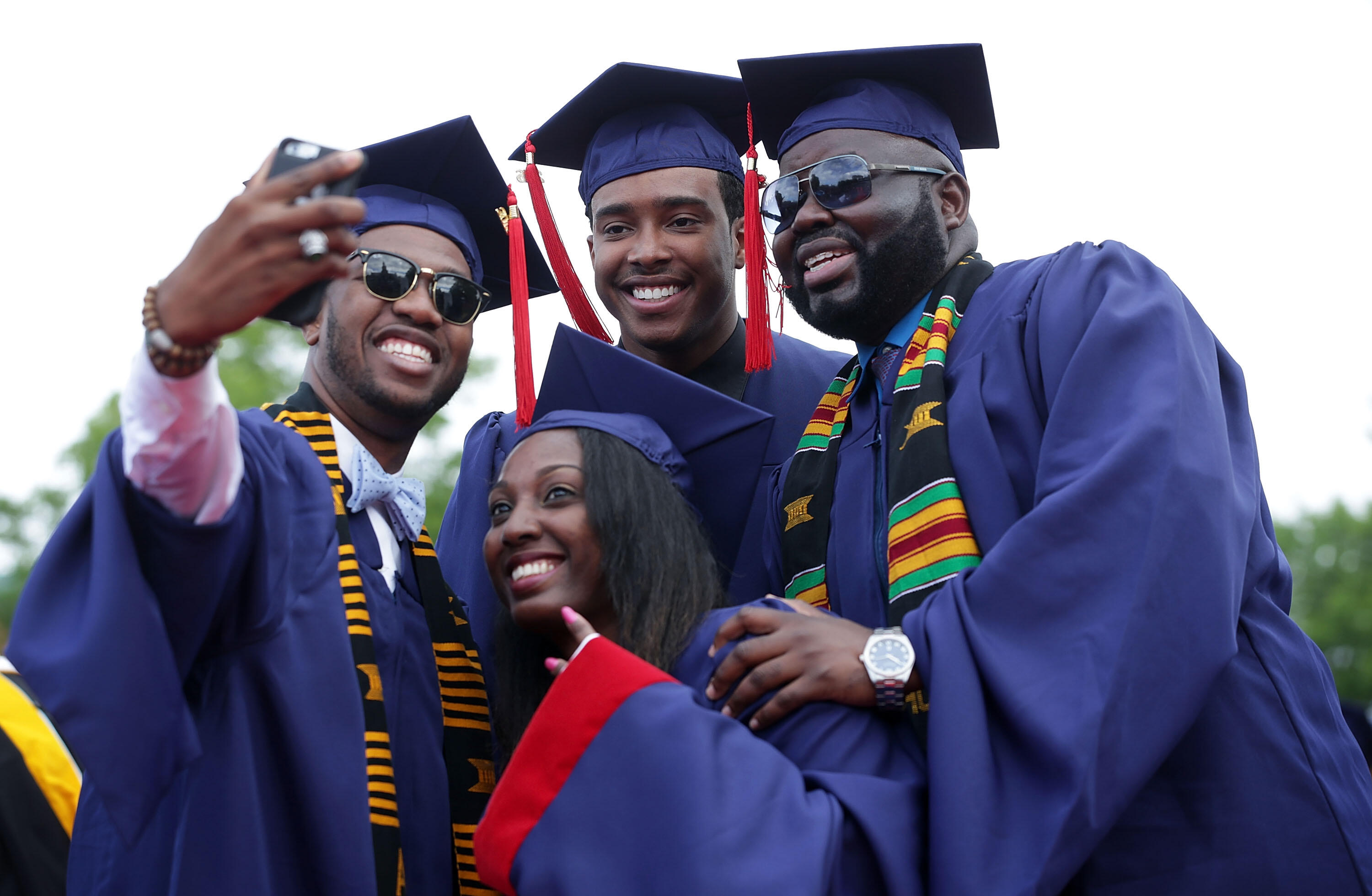 WASHINGTON, DC - MAY 07: Members of the class of 2016 take a selfie during the 2016 commencement ceremony at Howard University May 7, 2016 in Washington, DC. President Obama is the sixth sitting U.S. president to deliver the commencement speech at Howard 