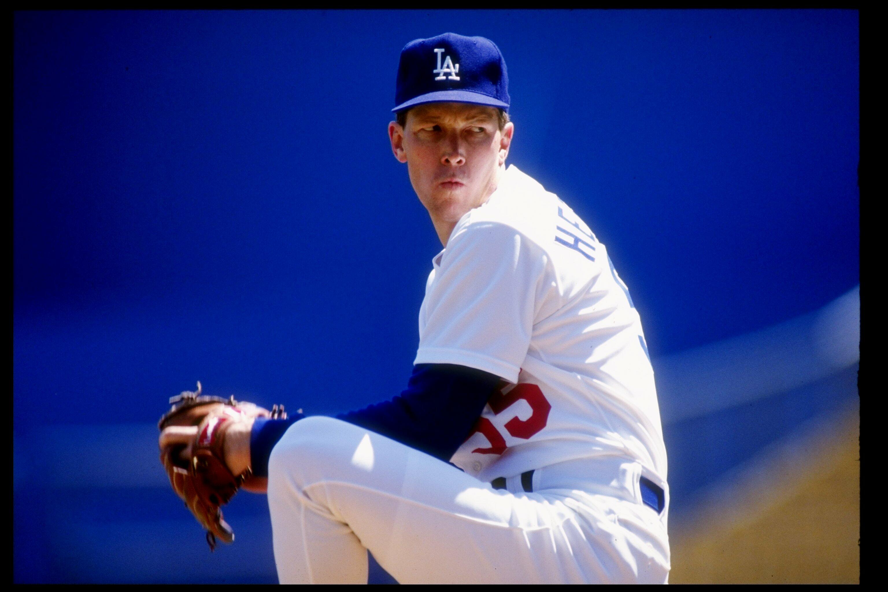1991:  Pitcher Orel Hershiser of the Los Angeles Dodgers winds up to pitch during a game. Mandatory Credit: Stephen Dunn  /Allsport