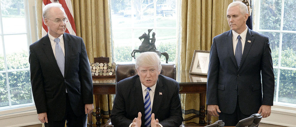 WASHINGTON, DC - MARCH 24: U.S. President Donald Trump reacts with HHS Secretary Tom Price (L) and Vice President Mike Pence (R) after Republicans abruptly pulled their health care bill from the House floor, in the Oval Office of  the White House on March