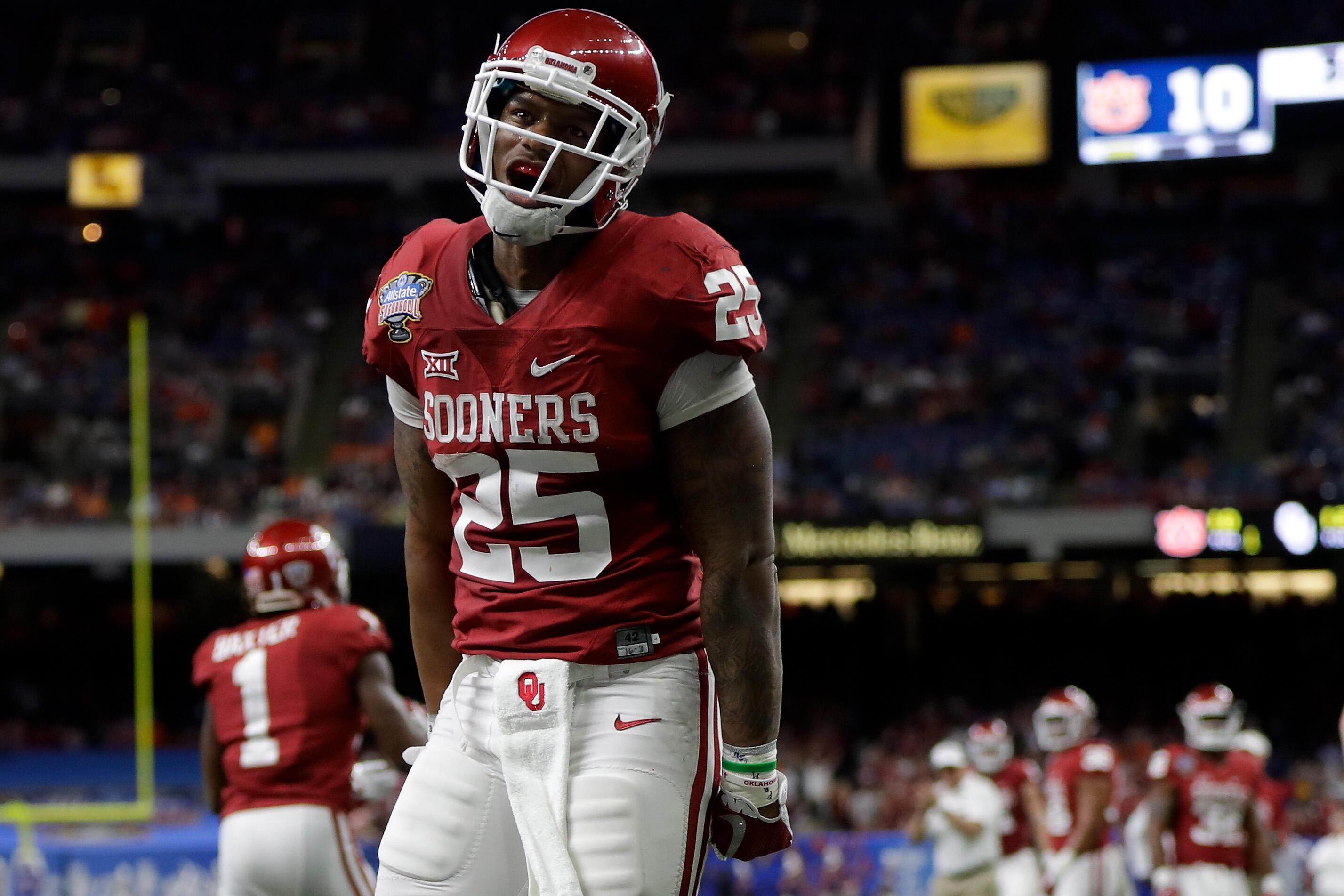 NEW ORLEANS, LA - JANUARY 02:  Joe Mixon #25 of the Oklahoma Sooners reacts after scoring a touchdown against the Auburn Tigers during the Allstate Sugar Bowl at the Mercedes-Benz Superdome on January 2, 2017 in New Orleans, Louisiana.  (Photo by Sean Gar