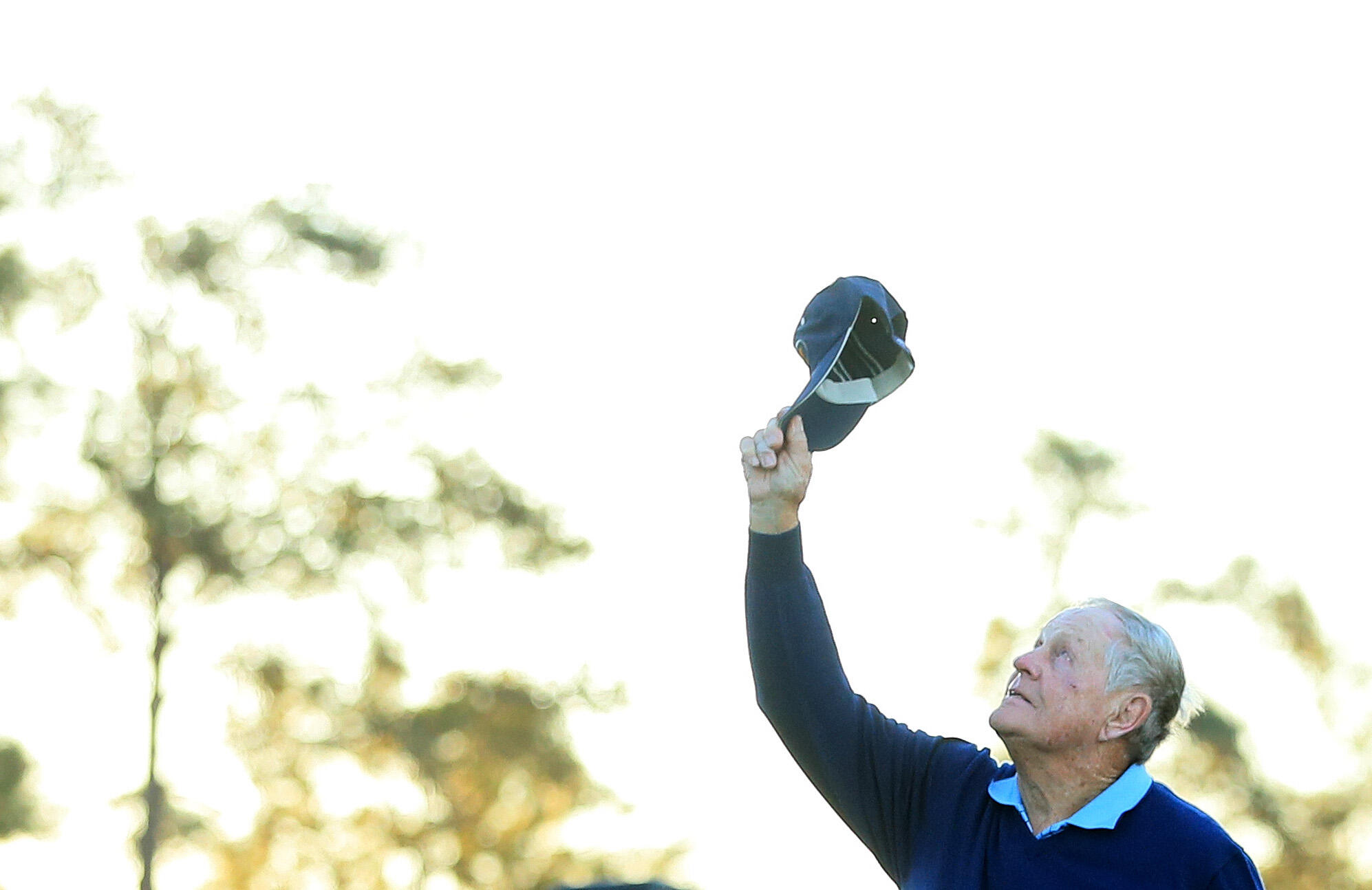 AUGUSTA, GA - APRIL 06:  Honorary starter Jack Nicklaus holds up his hat in honor of Arnold Palmer during the first tee ceremony prior to the first round of the 2017 Masters Tournament at Augusta National Golf Club on April 6, 2017 in Augusta, Georgia.  (