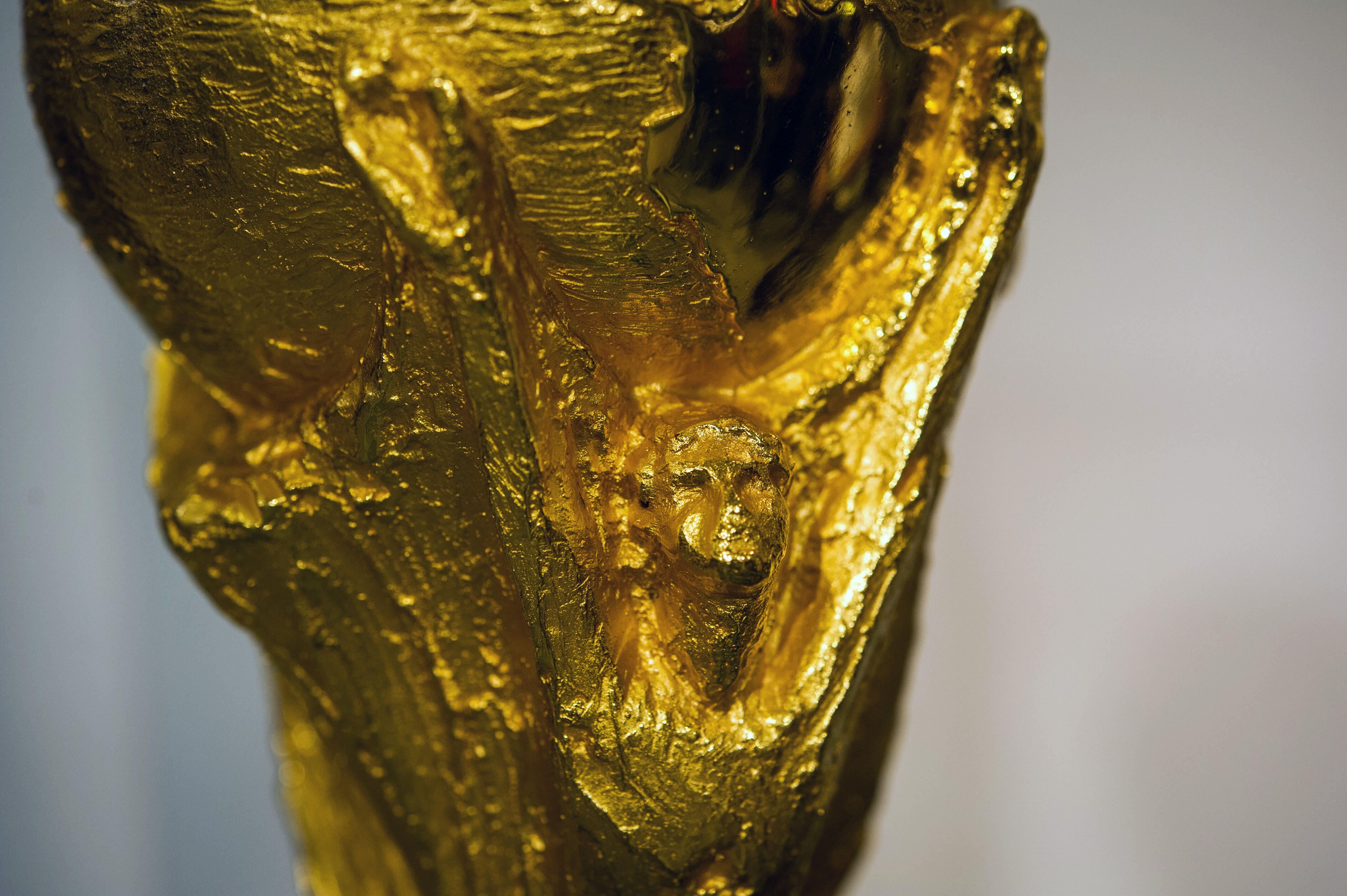 Detail of the trophy of the FIFA World Cup 2014, brought to Brazil by former Brazilian football player Cafu from the FIFA headqueaters in Switzerland, as it is displayed at Morumbi shopping center in Sao Paulo, Brazil, on September 22, 2012. AFP PHOTO/Yas