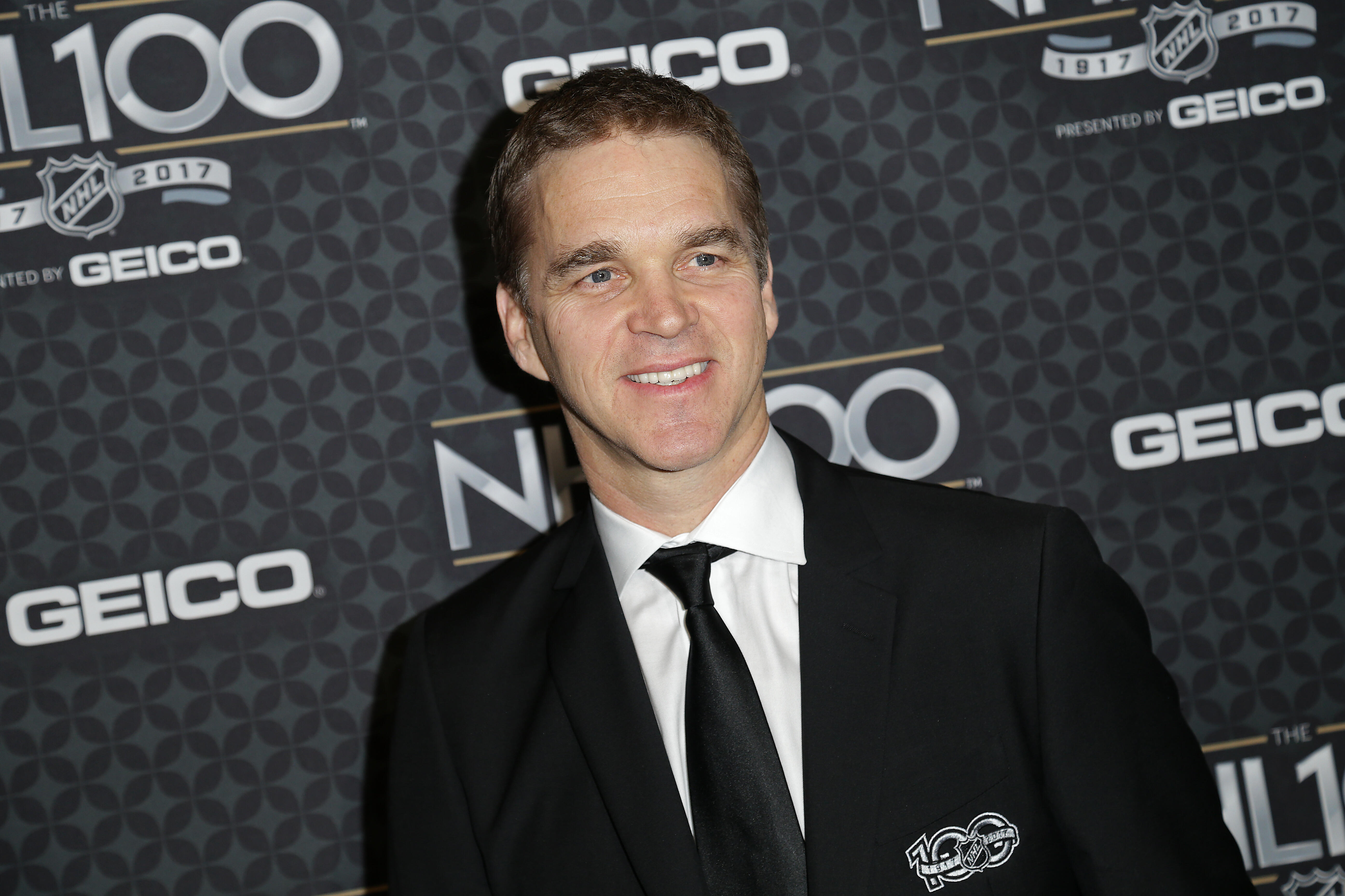 LOS ANGELES, CA - JANUARY 27:  President of Business Operations for the Los Angeles Kings Luc Robitaille arrives at the NHL 100 presented by GEICO Red Carpet as part of the 2017 NHL All-Star Weekend at the Microsoft Theater on January 27, 2017 in Los Ange