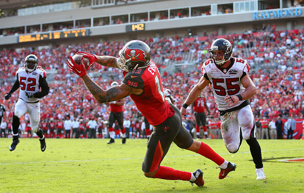 TAMPA, FL - DECEMBER 06:  Mike Evans #13 of the Tampa Bay Buccaneers catches the game-winning touchdown during the fourth quarter of the game against the Atlanta Falcons at Raymond James Stadium on December 6, 2015 in Tampa, Florida.  (Photo by Rob Foldy/Getty Images)