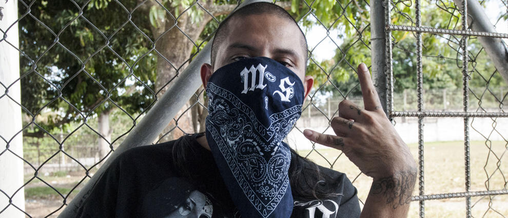 A Mara Salvatrucha gang member attends a press conference where leaders of the Mara Salvatrucha (MS-13) and Barrio 18 declared the city of Quezaltepeque a peace zone or 