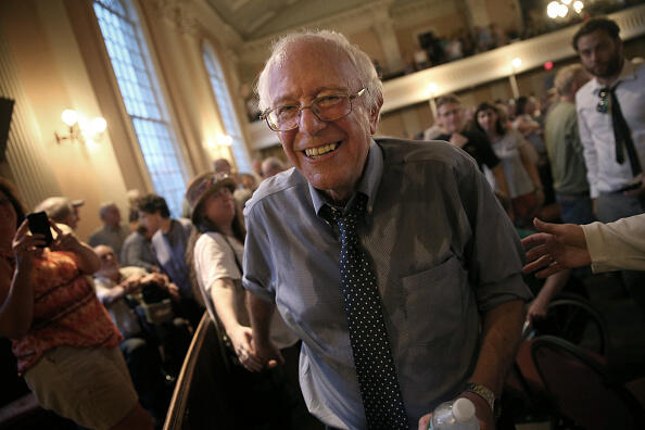 PORTSMOUTH, NH - MAY 27:  Democratic presidential candidate and U.S. Sen. Bernie Sanders (I-VT) finishes greeting supporters following a packed town meeting at the South Church May 27, 2015 in Portsmouth, New Hampshire. Sanders officially declared his candidacy yesterday and will run as a Democrat in the presidential election. He is former Secretary of State Hillary Clinton's first challenger for the Democratic nomination.  (Photo by Win McNamee/Getty Images)