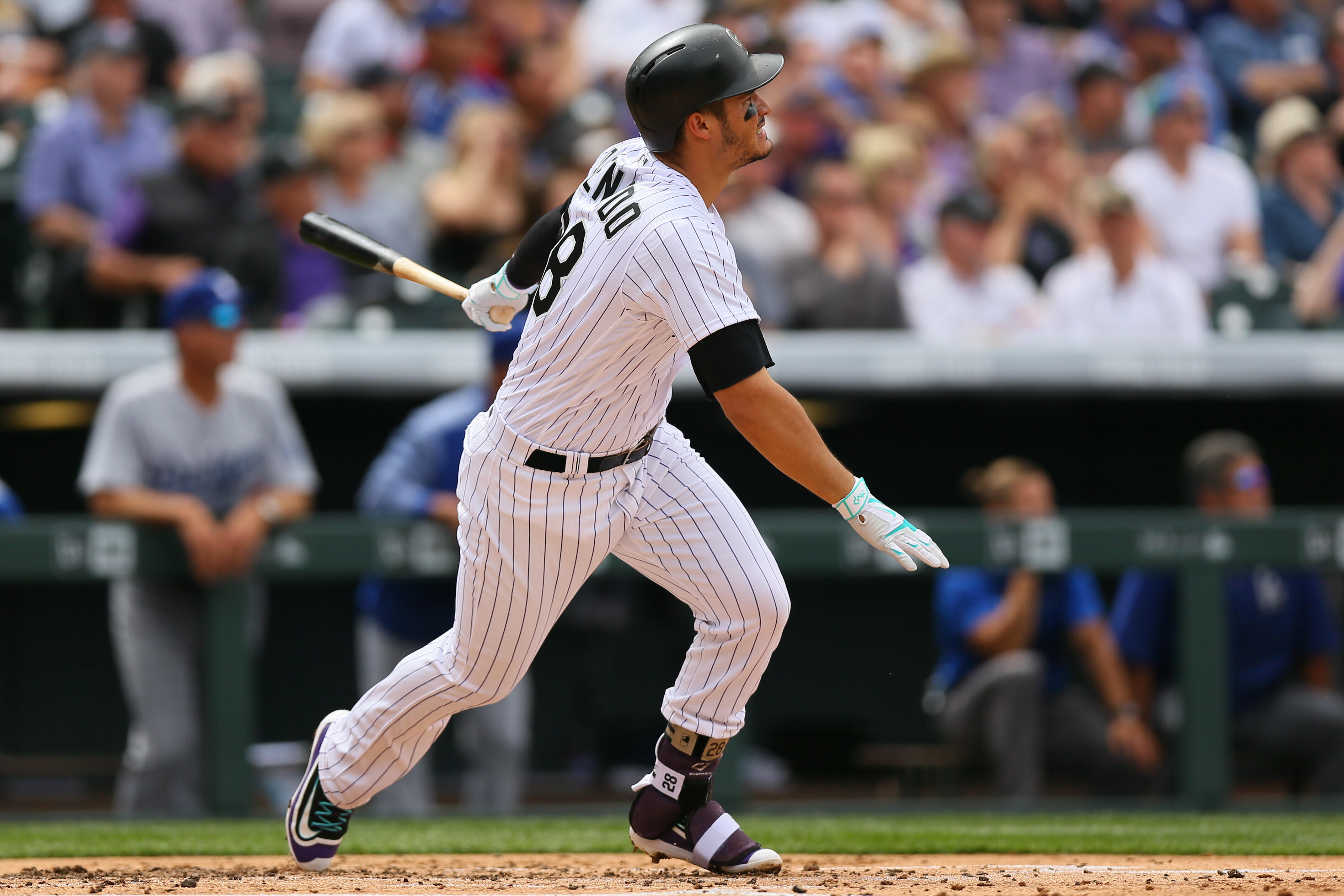 DENVER, CO - APRIL 7:  Nolan Arenado #28 of the Colorado Rockies watches his RBI double during the first inning of the opening day game against the Los Angeles Dodgers at Coors Field on April 7, 2017 in Denver, Colorado. (Photo by Justin Edmonds/Getty Ima