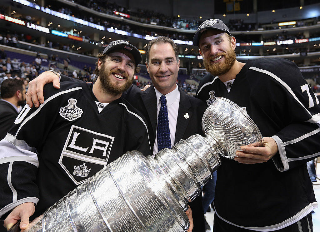 LOS ANGELES, CA - JUNE 11: (L-R) Former Philadelphia Flyers Mike Richards #10, assistant coach John Stevens and Jeff Carter #77 of the Los Angeles Kings hold up the Stanley Cup after the Kings defeated the New Jersey Devils 6-1 to win the Stanley Cup seri