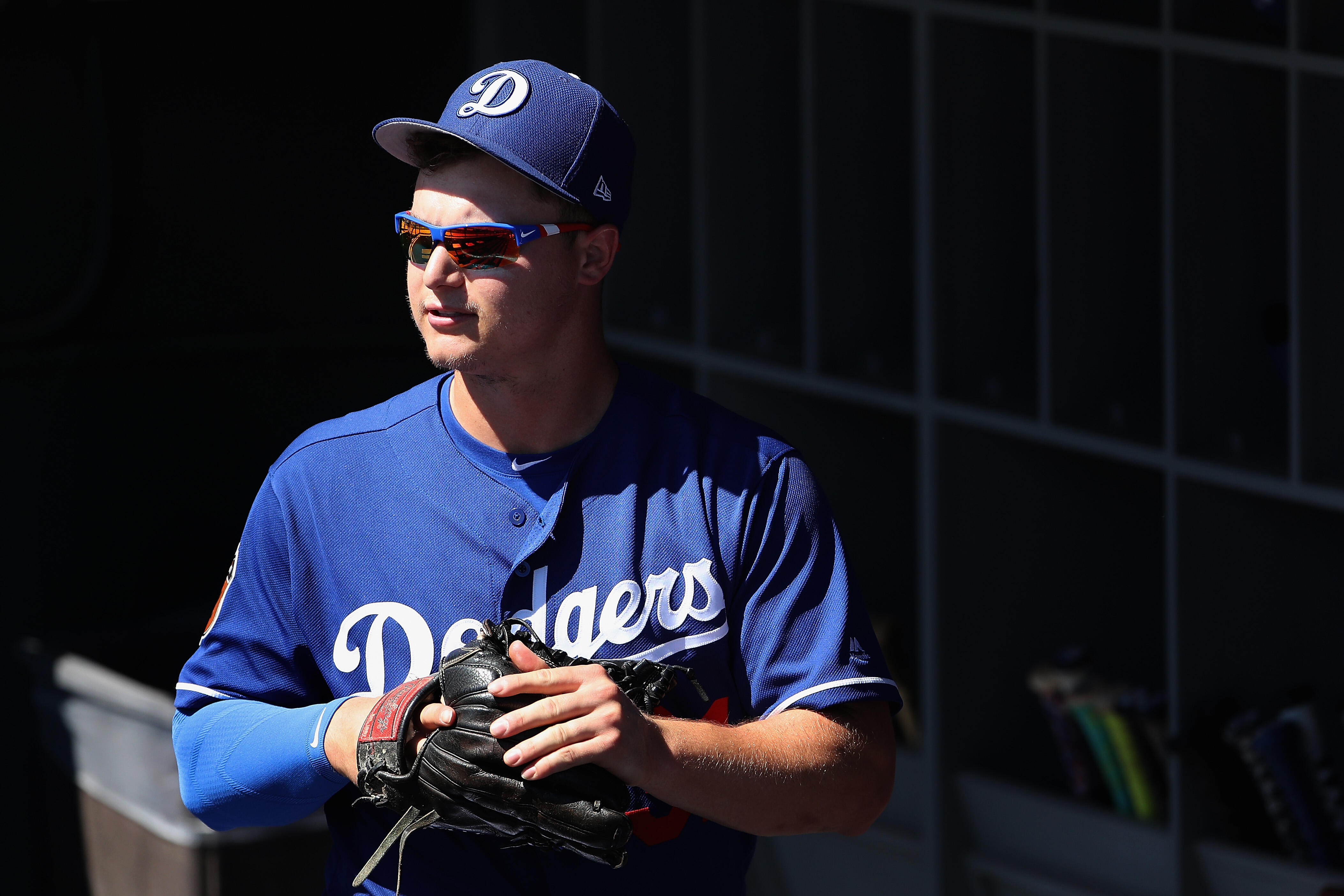 GLENDALE, AZ - MARCH 11:  Joc Pederson #31 of the Los Angeles Dodgers walks in the dugout before the MLB spring training game against the Los Angeles Angels at Camelback Ranch on March 11, 2017 in Glendale, Arizona.  (Photo by Christian Petersen/Getty Ima