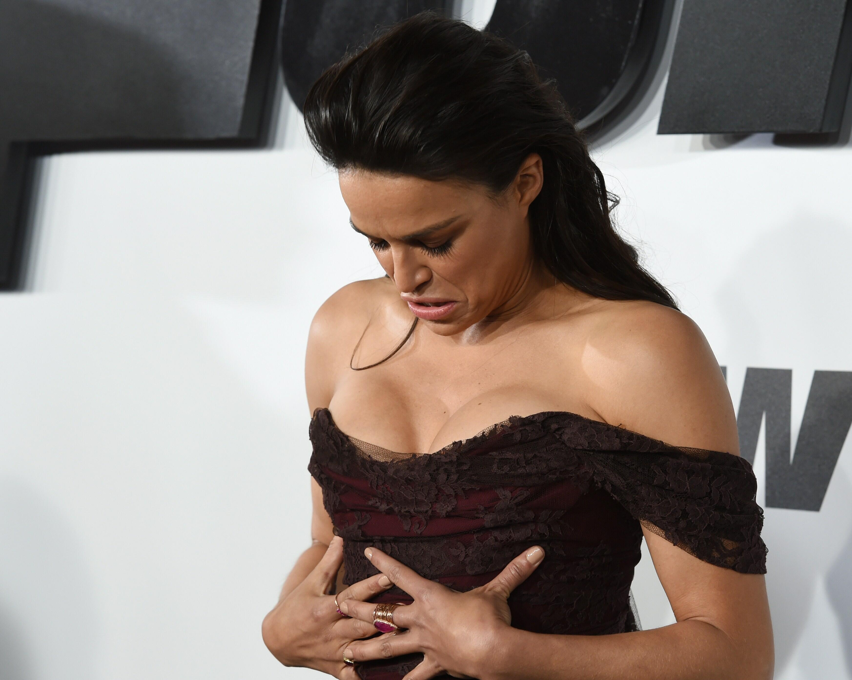 Actress Michelle Rodriguez attends the premiere of 'Furious 7' held at the TCL Chinese Theatre in Hollywood, California on April 1, 2015.           AFP PHOTO/Mark RALSTON        (Photo credit should read MARK RALSTON/AFP/Getty Images)