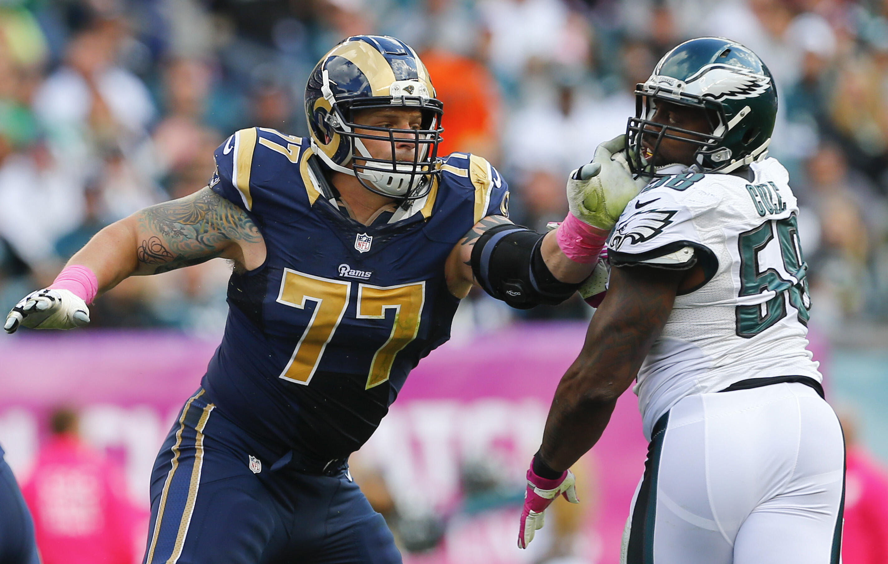 PHILADELPHIA, PA - OCTOBER 5: Offensive tackle Jake Long #77 of the St. Louis Rams blocks linebacker Trent Cole #58 of the Philadelphia Eagles in the third quarter on October 5, 2014 at Lincoln Financial Field in Philadelphia, Pennsylvania. (Photo by Rich