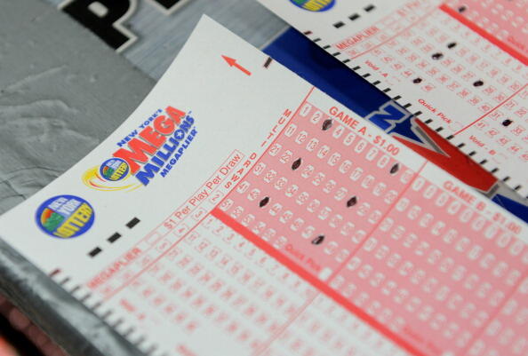 Mega Millions lottery ticket forms at a convenience store on the east side of Manhattan March 30, 2012 in New York. The jackpot is at a record level because no one has matched the magic five numbers and Mega Ball since January 24 -- a full 18 drawings wit