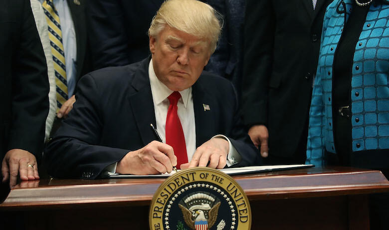 WASHINGTON, DC - APRIL 26:  U.S. President Donald Trump signs the Education Federalism Executive Order that will pull the federal government out of K-12 education, in the Roosevelt Room at the White House, on April 26, 2017 in Washington, DC.  (Photo by M