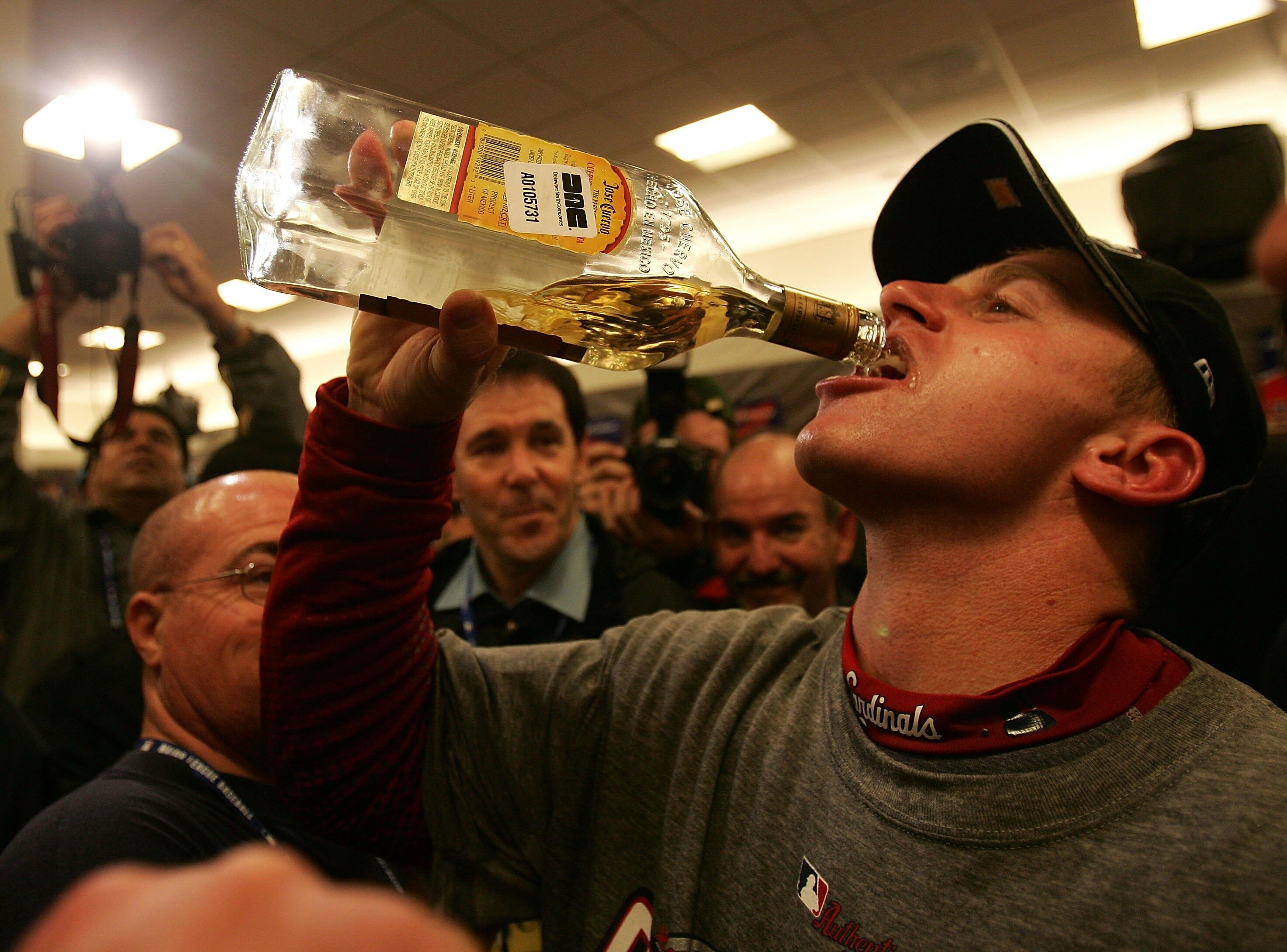 ST LOUIS, MO - OCTOBER 27:  World Series MVP David Eckstein #22 of the St. Louis Cardinals drinks tequila in the locker room after the Cardinals 4-2 win against the Detroit Tigers in Game Five to win the 2006 World Series on October 27, 2006 at Busch Stad