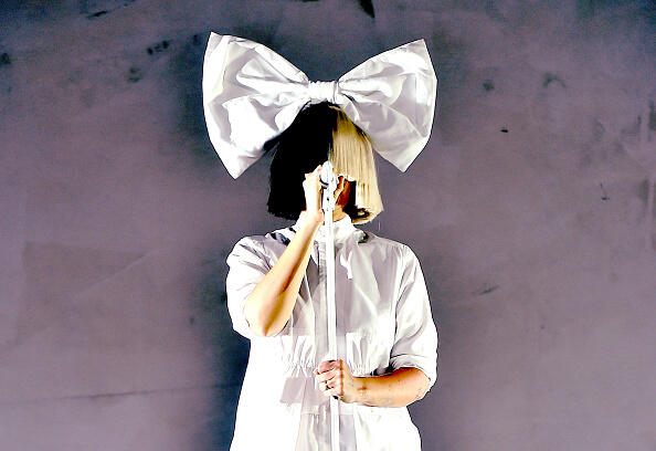 INDIO, CA - APRIL 17:   (EDITOR'S NOTE: This image has been digitally filtered.) Singer Sia performs onstage during day 3 of the 2016 Coachella Valley Music & Arts Festival Weekend 1 at the Empire Polo Club on April 17, 2016 in Indio, California.  (Photo by Kevin Winter/Getty Images for Coachella)