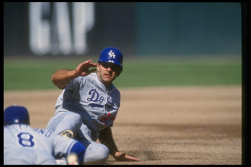 5 May 1993: First Basemen Eric Karros of the Los Angeles Dodgers slides into third base during the Dodgers game against the San Francisco Giants at Candlestick Park in San Francisco, California.